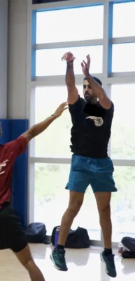 Dr. Muroch playing basketball