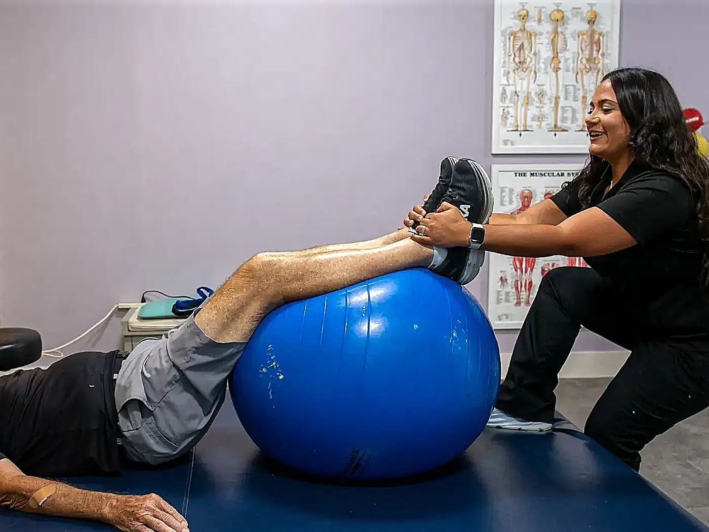 Man receiving ankle pain treatment