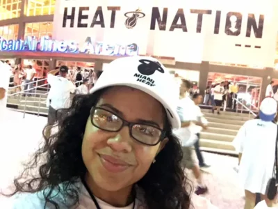 Helen Corrales at a Heat basketball team game