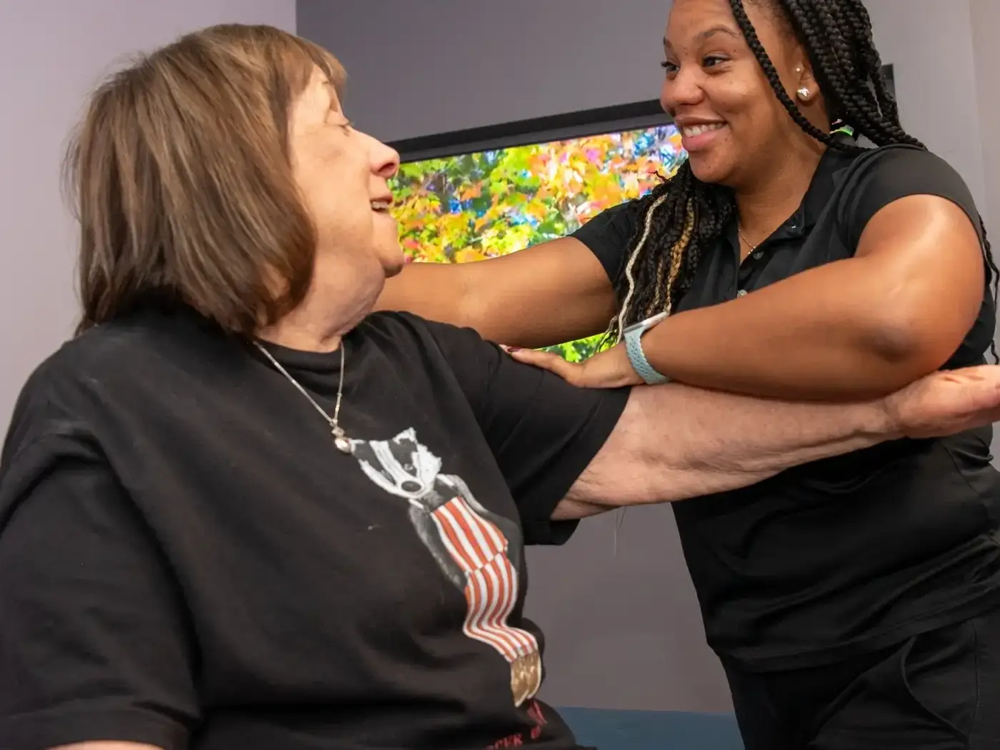 Female receiving shoulder joint pain treatment