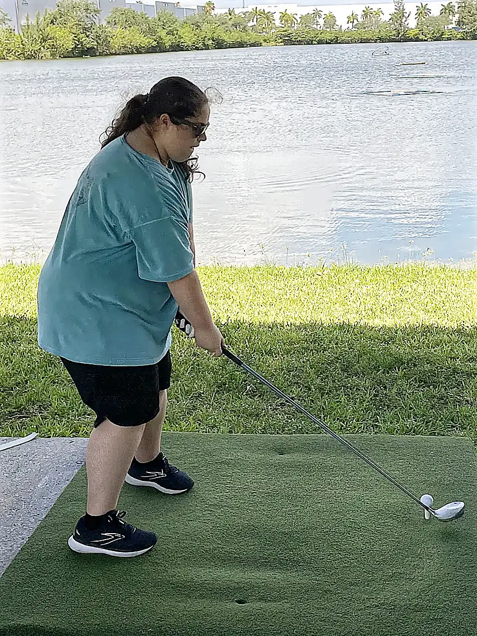 Dr. Rachel Mindel golfing